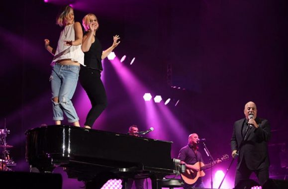 Watch: Amy Schumer & Jennifer Lawrence Dance On Billy Joel’s Piano